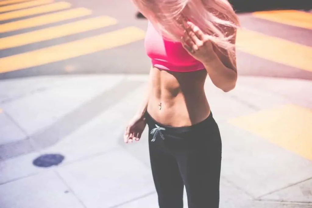 Woman with toned stomach after LA-EMS Body Sculpting Treatment Streatham Hill