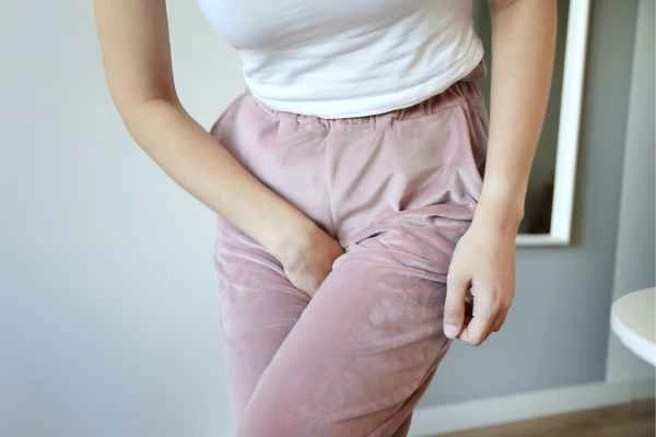 woman running for the toilet because of urinary incontinence Streatham Hill